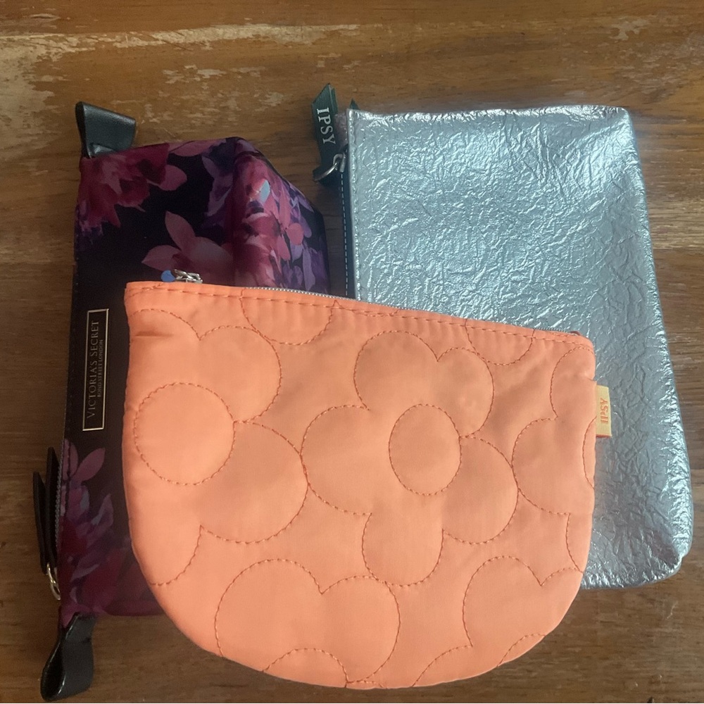 Set of Three Cosmetic Bags - Floral, Silver, and Orange